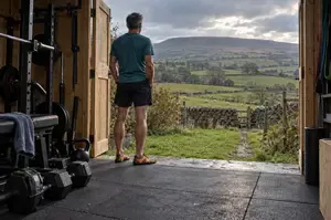 Andrew looking out from his shed into the Pendle countryside