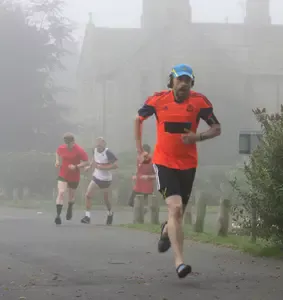Andrew running Pendle parkrun