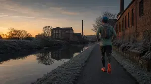 Andrew running down Peak Forest canal - Ashton-under-Lyne