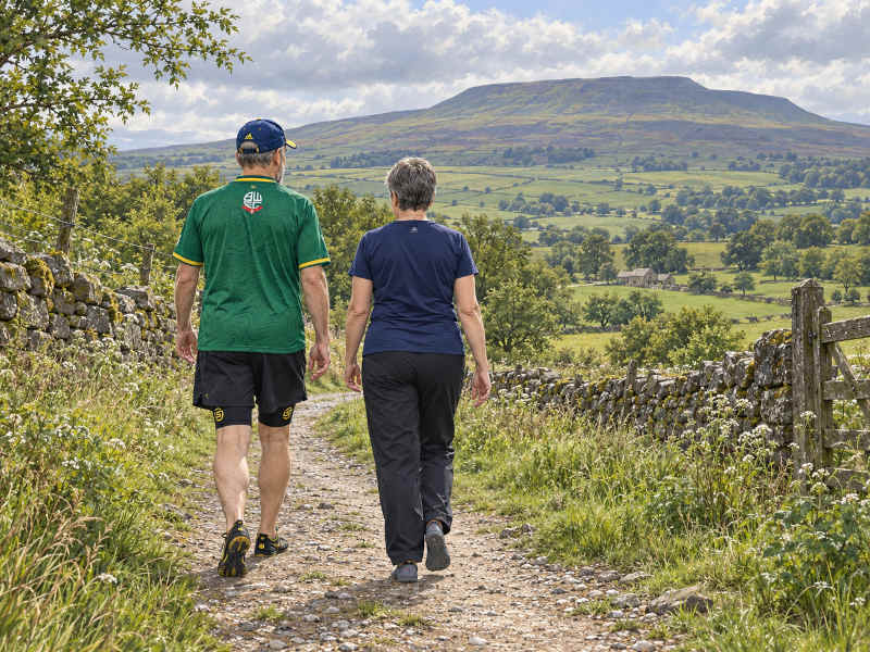 Julie and I run walking towards Pendle Hill Julie and I run walking towards Pendle Hill